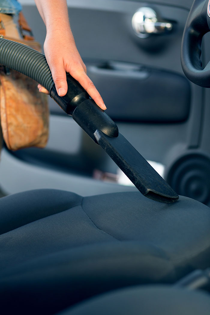 During regular car maintenance checks, make sure to vacuum your car at least once a week.